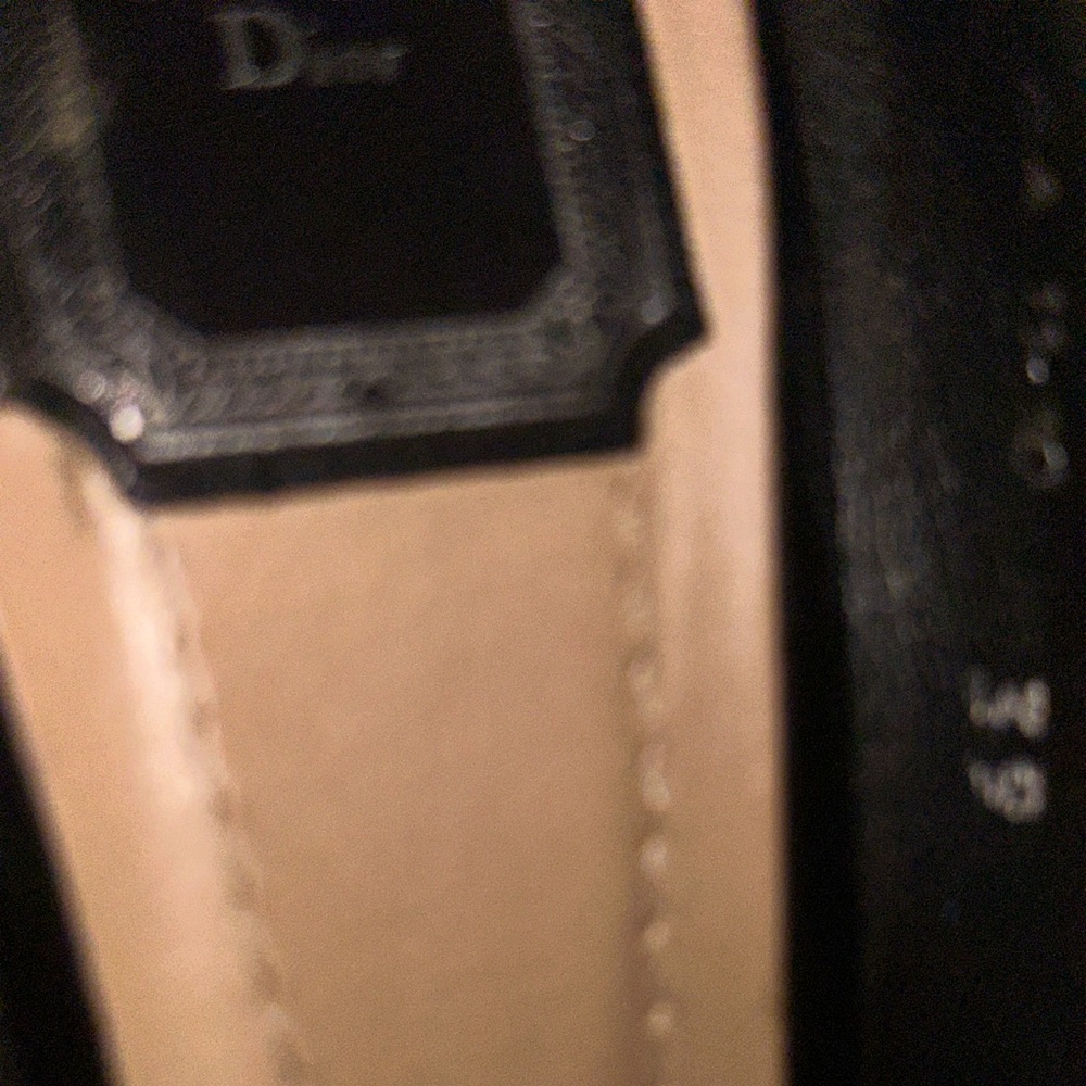 Black peep toe Dior pumps with buckle and charm. Authentic, minor signs of wear.